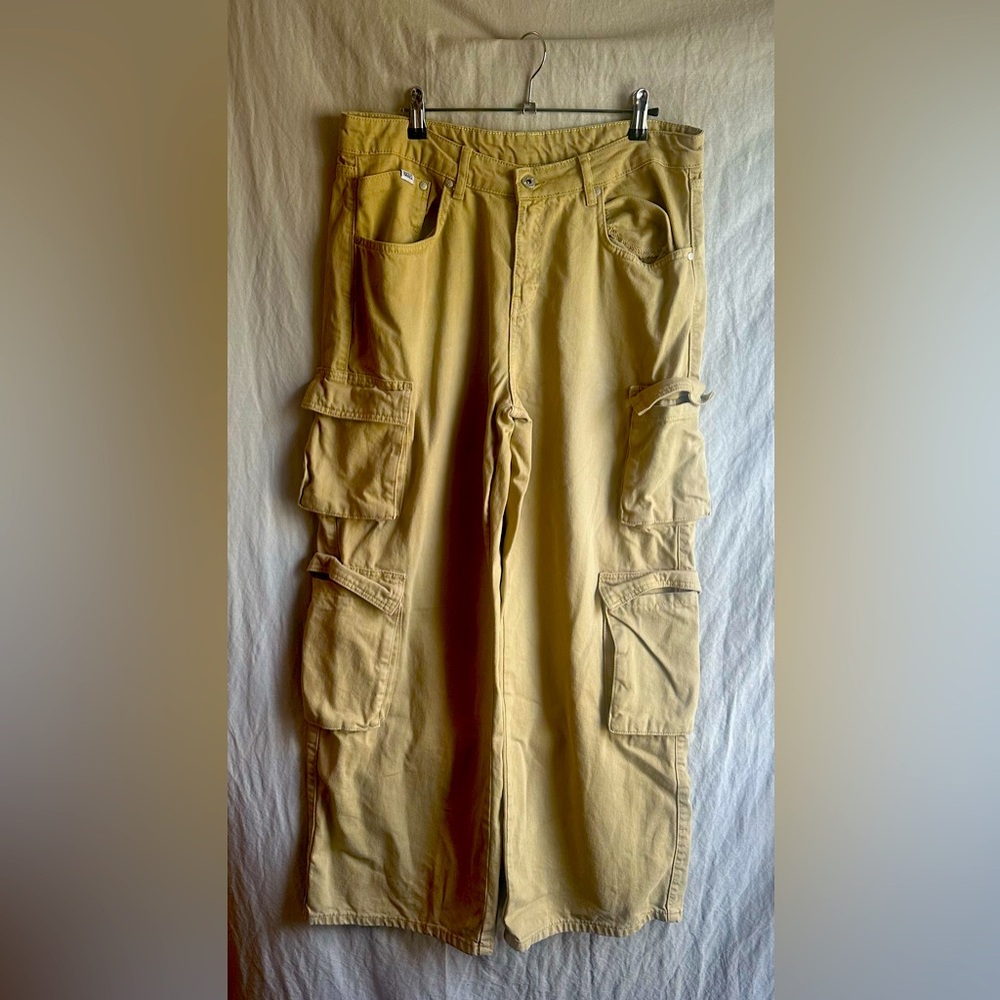 RAGGED PRIEST Wide leg, low rise tan cargo pant.